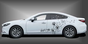 Auto Aufkleber Pusteblume in Schwarz auf weißem Mazda 6